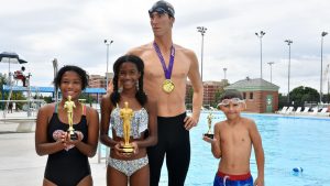 Wax Michael Phelps Visits DC Pool