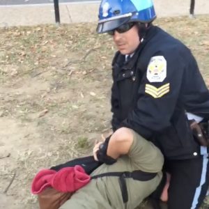 Video: Park Police Officer Sits on DC High School Student Protesting Trump
