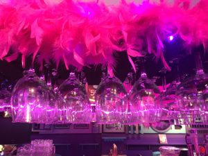 Crystal City’s Center Of LGBTQ Life Is a Purple Beach Bar–With Barbies