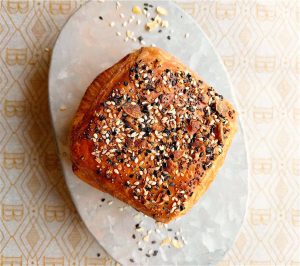 Lil’ B Opens With “Everything” Croissants and Colonial-Style Grits