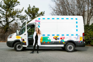 A Truck Carrying a Pedal-Powered Turntable Is Cruising Around Arlington, Explaining Art