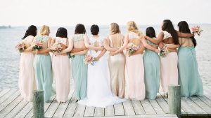 He Stepped in When She Needed a Dance Partner. Seven Years Later, They Wed In a Pastel Ceremony by the Sea.