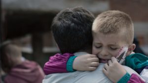 Crammed into a Truck and Unable to Breathe, This George Mason Grad Became a Refugee at 6. Erblin Nushi Reflects on His Childhood Trauma in the Short Film “Bini.”