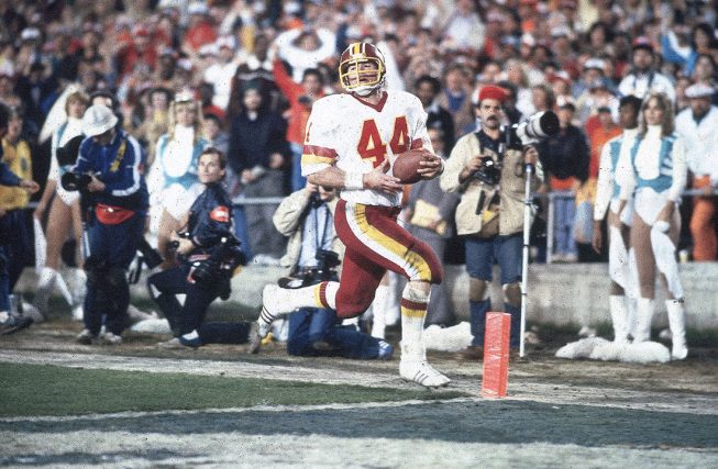 Riggo rushing in his famous 43-yard touchdown against the Miami Dolphins. Photograph by Tony Tomsic/Sports Illustrated/Getty Images.