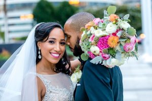 Lush Pink Florals and a Boxwood Escort Wall Gave This Ballroom Wedding a Garden Vibe