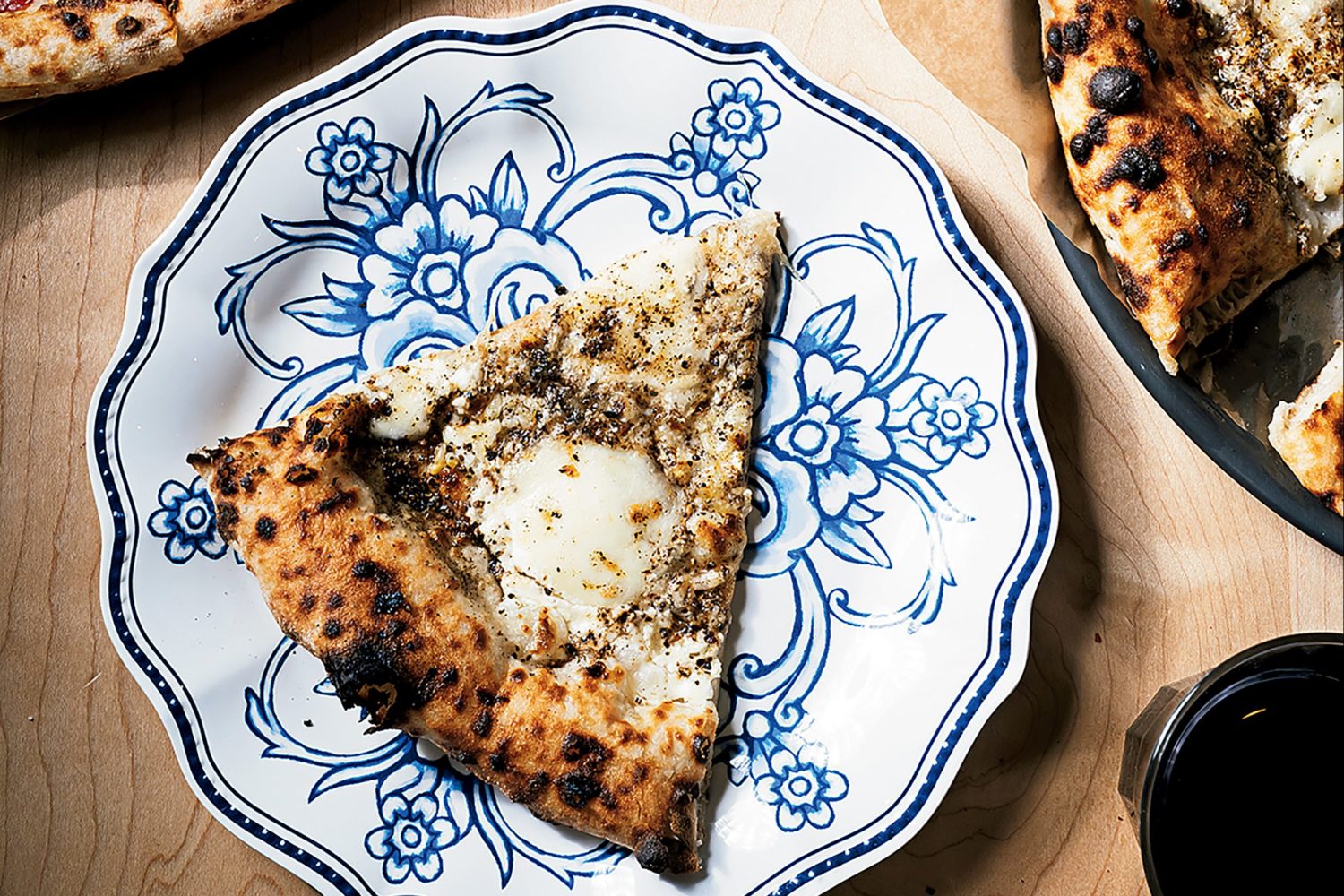 Stelinas cacio e pepe slice.