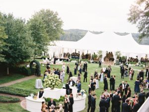 At Their Ultimate Backyard Wedding, This Couple Used Framed Photos of Guests as Escort Cards