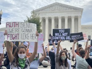 PHOTOS: Pro-Life and Pro-Choice Activists Flooding the Supreme Court As New Term Begins