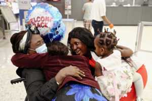 PHOTOS: Joy and Tears at Dulles Airport