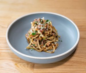Recipe: Try This Bucatini With Spicy Pork-Belly Ragu From Reveler’s Hour