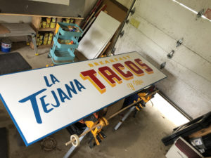 What’s Up With All the Hand-Painted Shop Signs?