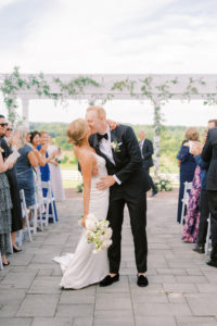 This Classic Wedding Design Included a Black-and-White Escort Wall of Bud Vases
