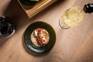 This DC Restaurant Bought a K Glass Crusher to Turn Wine Bottles Into Plates