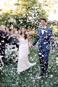 The Skeleton-Filled Escort Card Display Was This Halloween-Loving Couple’s Favorite Wedding Detail